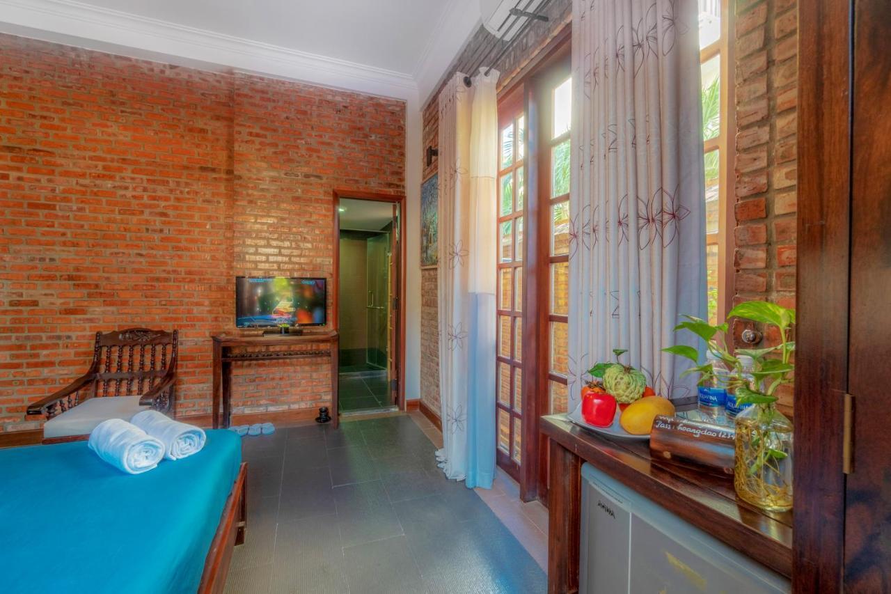 Calm House Hotel Hoi An 1 Экстерьер фото